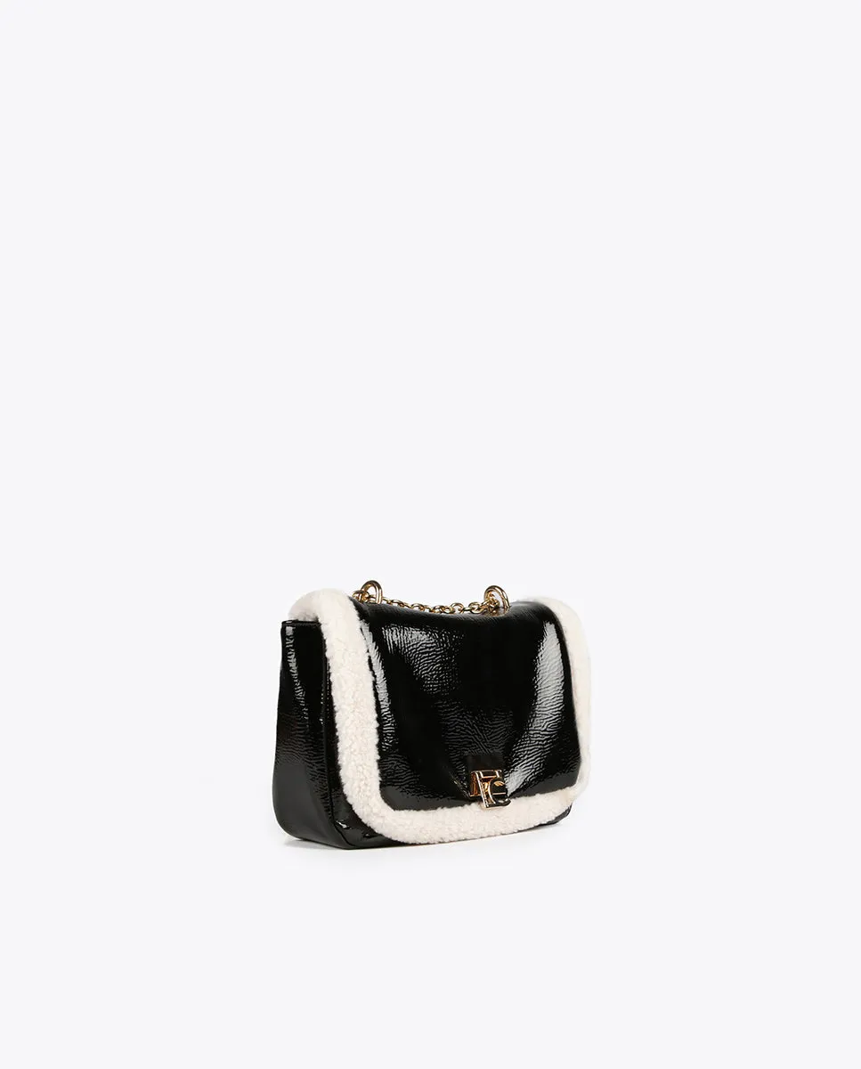 Crossbody bag with faux shearling details