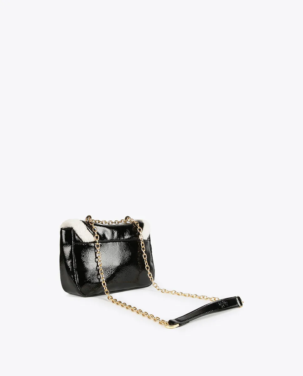 Crossbody bag with faux shearling details